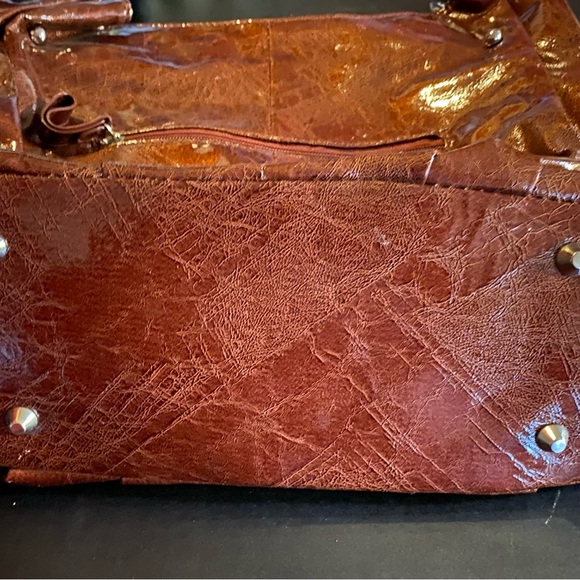 Gorgeous brown purse with polka dots and a huge flower embellishment. - Picture 2 of 6